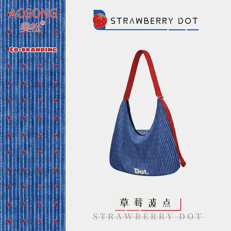 奥松蓝色草莓波点帆布包女2025新款高级感小众斜挎包上班通勤JSR