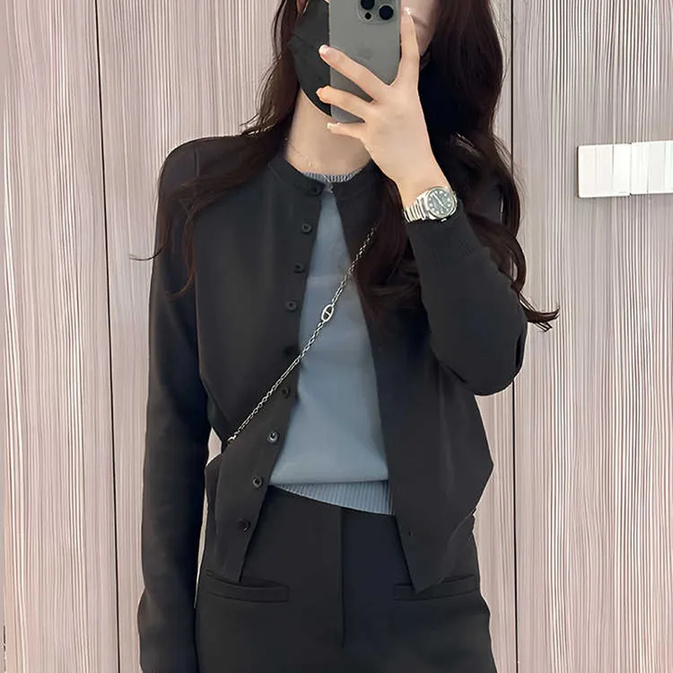 春秋长袖针织开衫女2025新款爆款早春洋气内搭假两件撞色拼接上衣