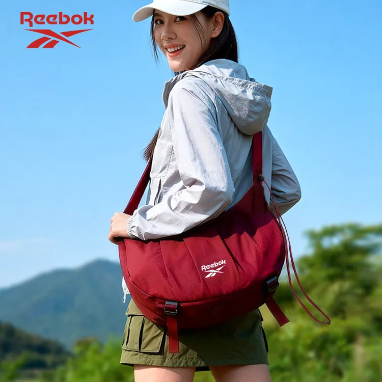 Reebok/锐步斜挎包女大容量旅行通勤百搭轻便运动健身单肩饺子包