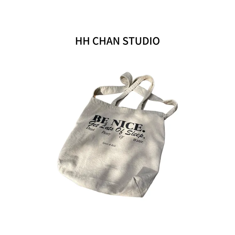 HH.CHAN“喝水大王”100%棉籽颗粒水洗单肩米黄色帆布包HH52V37782