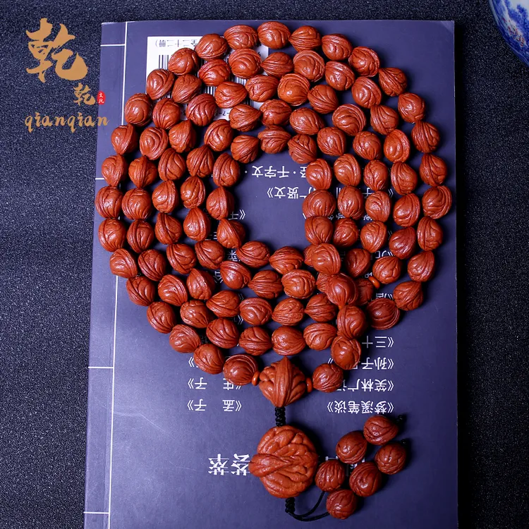 龙纹桃核108颗脖挂天然玉龙鳍1.0红籽精品无修长串多圈桃核手串