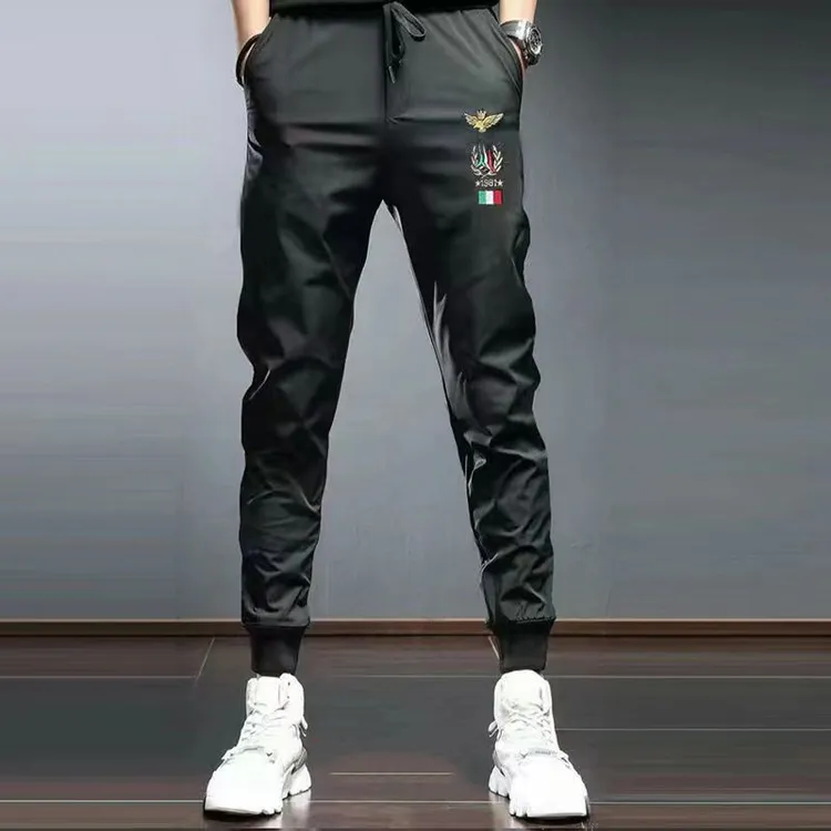 欧洲站夏季欧韩版男士时尚气质修身小脚裤冰丝速干薄款九分休闲裤