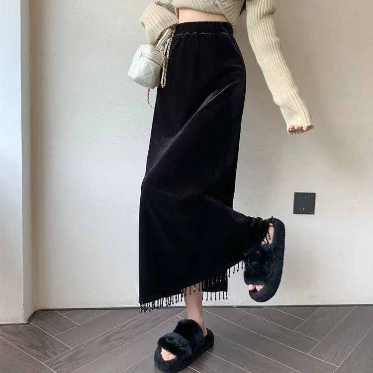 流苏垂感中长款丝绒a字半身裙女秋冬新款高腰显瘦黑色开叉一步裙