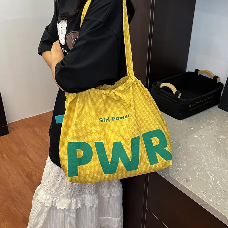 托特包女抽绳设计单肩包可折叠小众尼龙布包休闲大容量包包购物袋