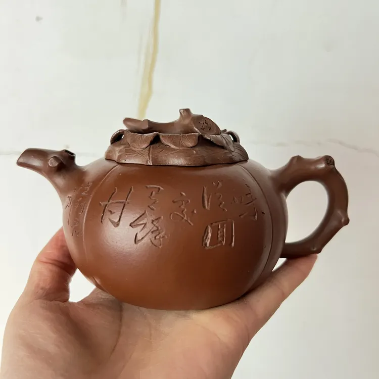 紫砂精致原矿老紫泥320cc寿桃壶