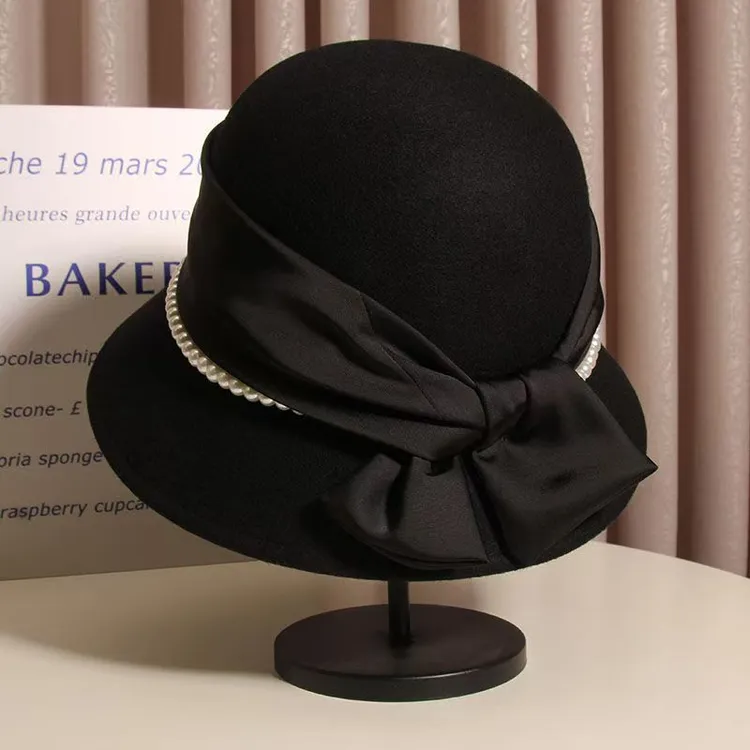 法式赫本风珍珠丝带蝴蝶结毛呢渔夫盆帽女秋冬英伦名媛百搭礼帽