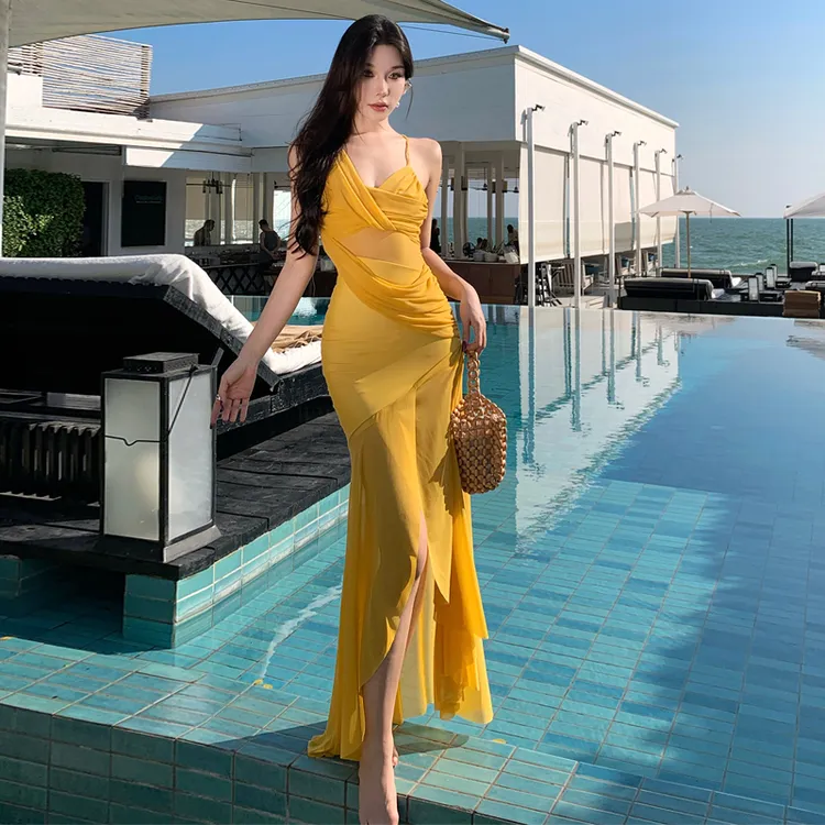 黄色V领网纱褶皱露背吊带连衣裙海边度假风显瘦遮肉开叉长裙ZC60