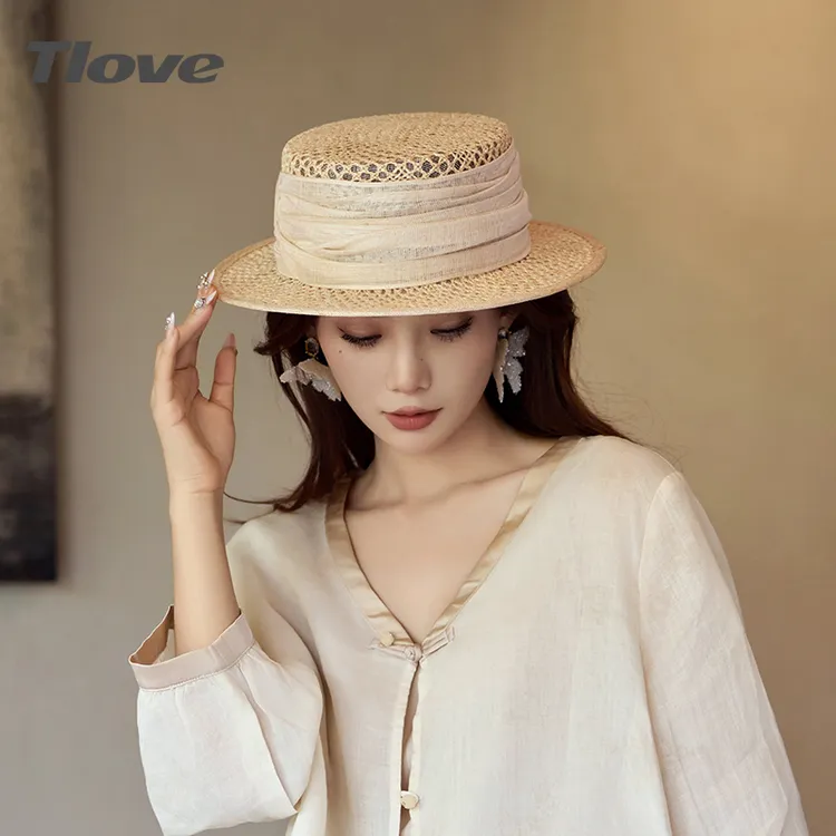 6940法式复古镂空草帽女夏平顶遮阳帽手工编织沙滩礼帽