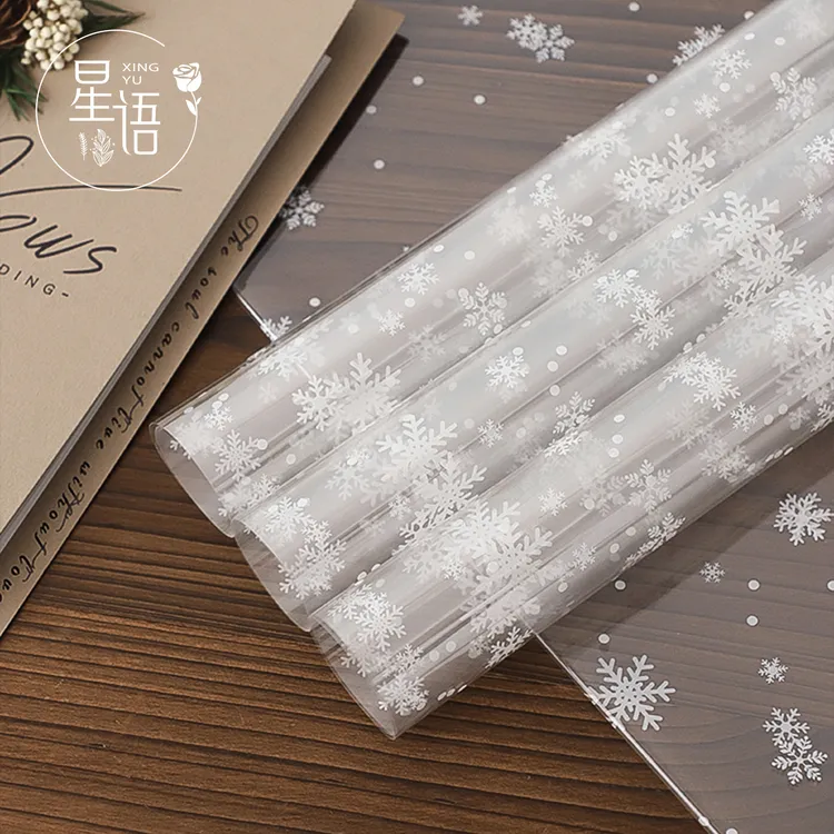 直播【星语】圣诞节雪花玻璃纸高透OPP防水花束包装盒冬日雪花透明纸diy