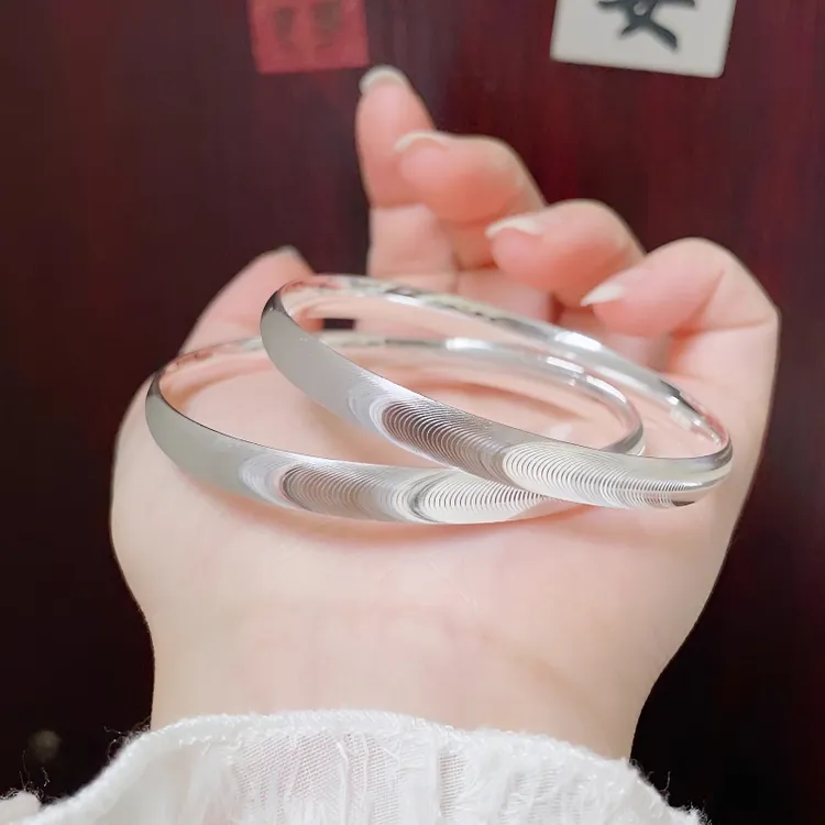 合金手镯 高端银镀层女手镯银色猫眼实心镯子时尚百搭闪爆亮小众商品图