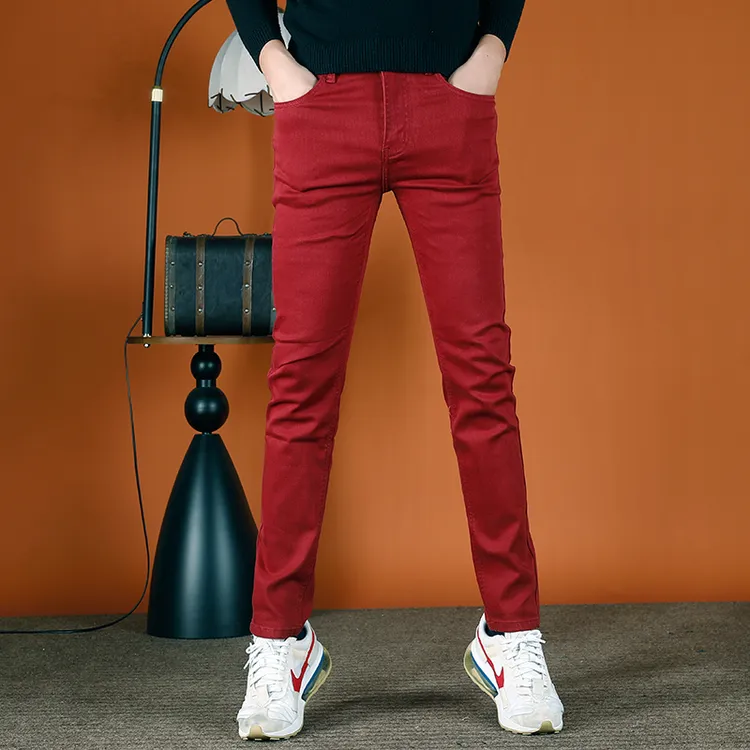 红色牛仔长裤男2025秋季新款百搭弹性休闲裤子男士修身小脚裤厚款