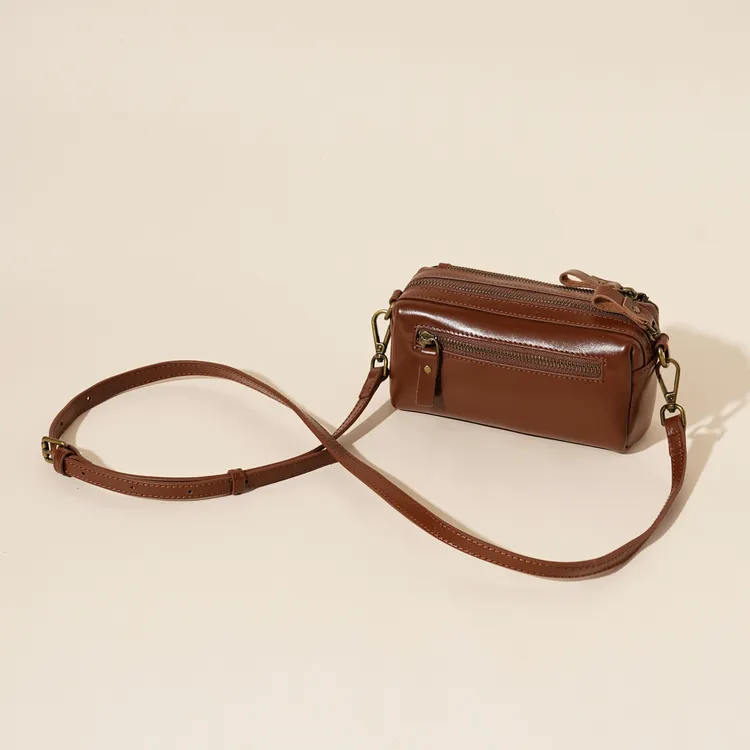 岩牛百搭软纯色复古英伦风休闲斜挎包YN3647