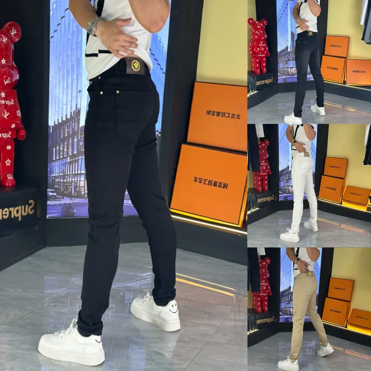高弹力男秋冬牛仔裤弹力拉链金属装饰小脚裤2509