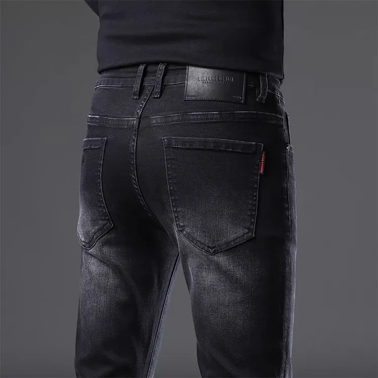 高端黑灰色牛仔裤男士2025秋冬季新款修身小脚休闲百搭弹力长裤子