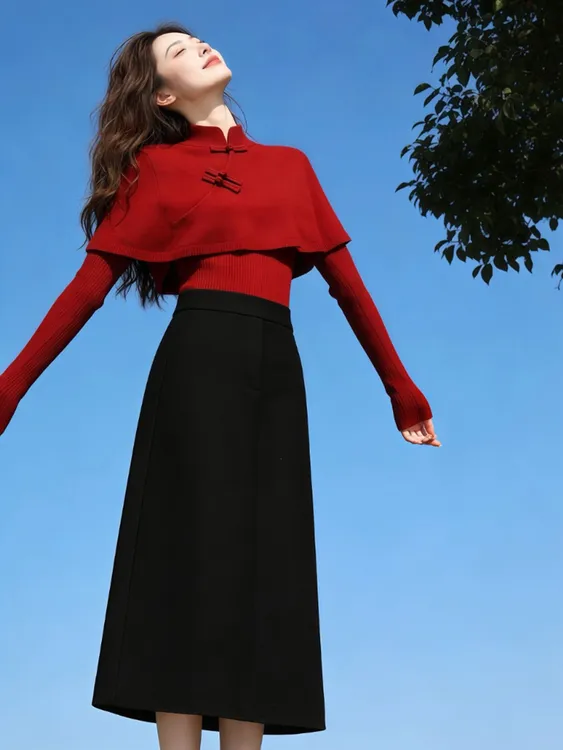2025冬季新款轻熟风气质新中式盘扣红色针织斗篷毛衣半身裙两件套