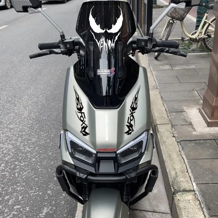 适用台铃火眼机甲3封神电动车头火焰眉毛毒液风挡改装饰眼睛贴纸