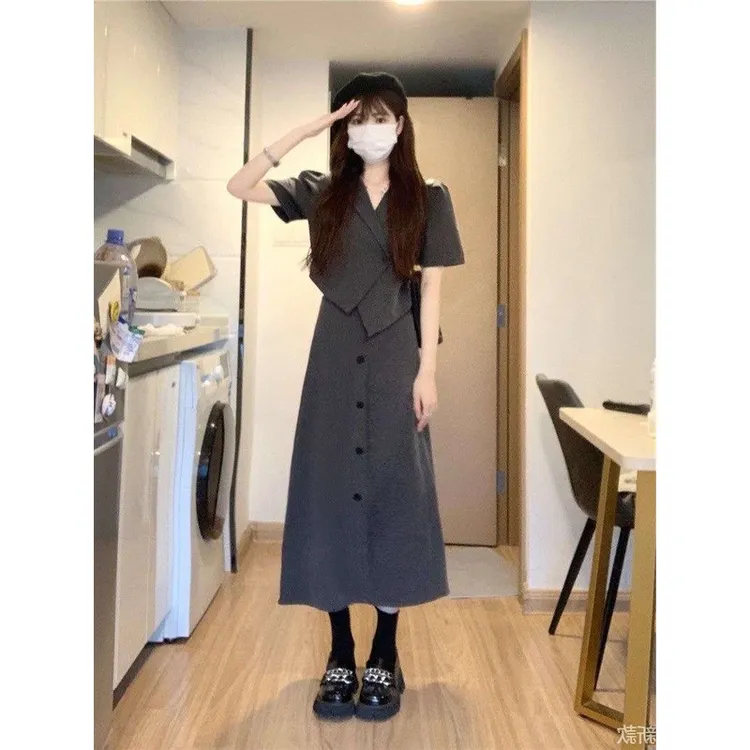 套装女2023夏季新款港风短款不规则翻领西装上衣高腰半身裙两件套