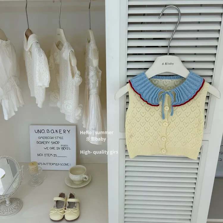现【乐恩baby】女童套装夏季清新镂空黄色针织背心花苞短裤两件套