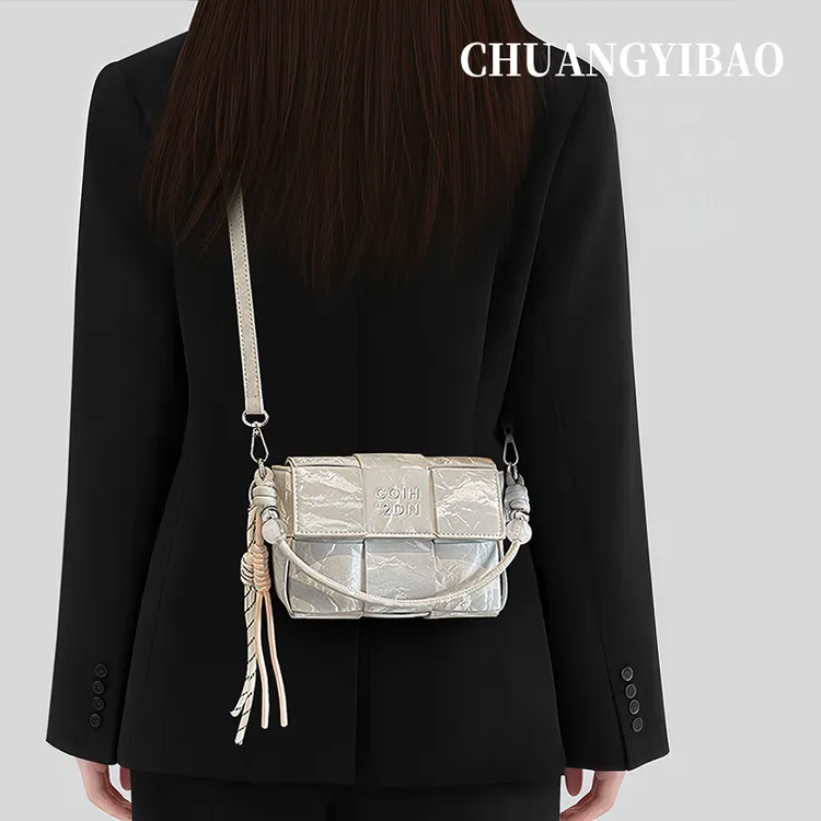 银色超火手提编织包包女士2025新款轻奢小众设计高级感单肩斜挎包