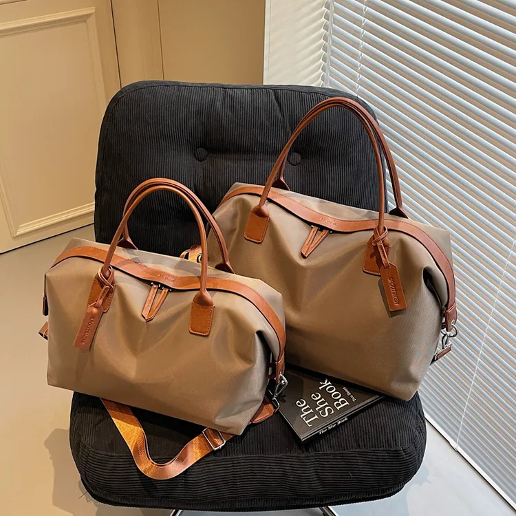 新款大容量短途旅行包提收纳袋出差旅游行李包韩版斜挎运动健身包