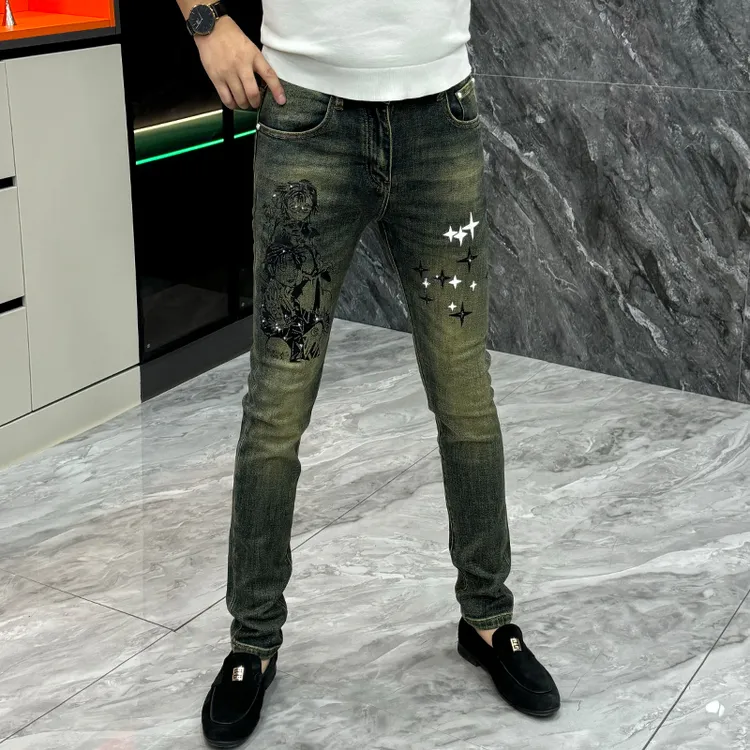 高端轻奢男士牛仔裤秋季时尚潮流卡通印花长裤欧货复古水洗直筒裤