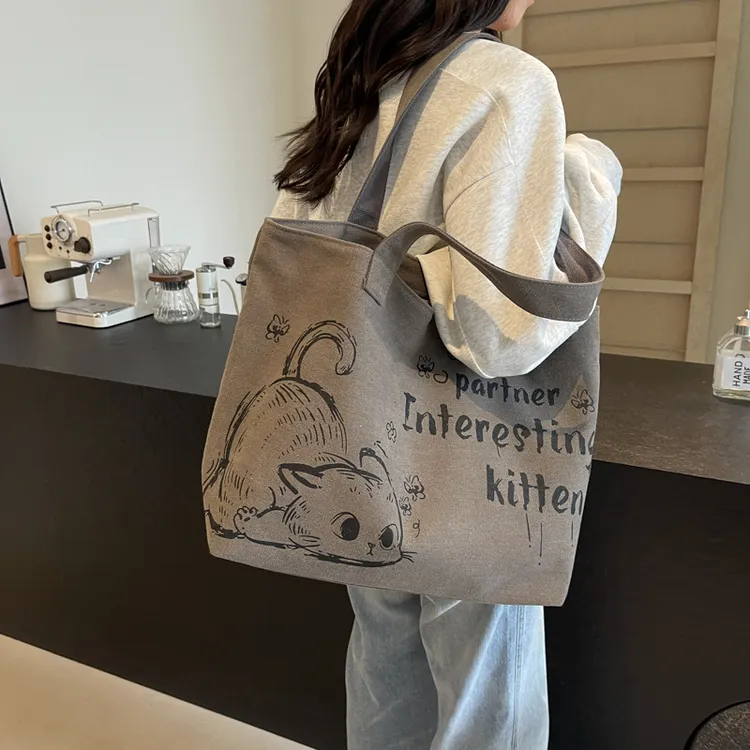 休闲大容量帆布托特包包女2025新款夏季通勤单肩包外出手提购物袋