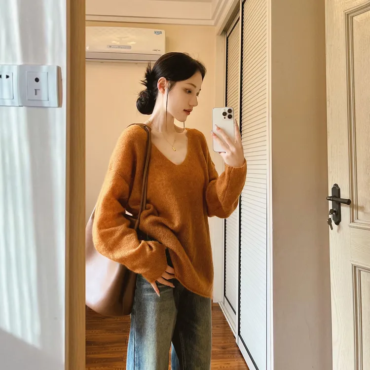 橘色v领长袖针织衫女春秋2025高级慵懒风软糯毛衣内搭打底衫上衣
