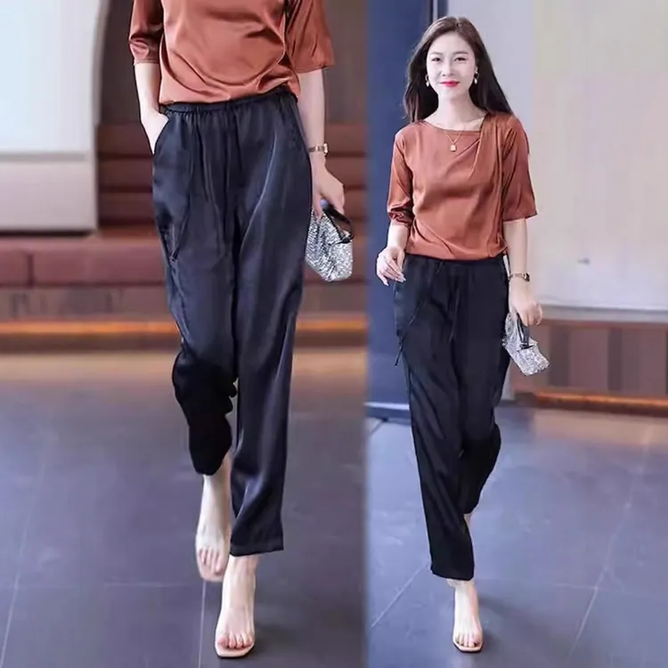 啄木鸟夏天冰丝薄款女裤新款醋酸锻面垂感哈伦裤显瘦九分裤凉凉裤