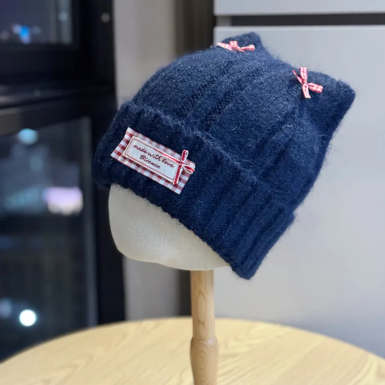 韩版毛线帽子女可爱猫耳朵新款蝴蝶结保暖护耳冷帽冬季时尚针织帽