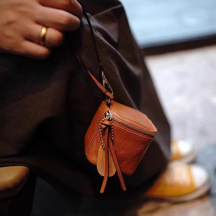 【冬季上新】简约植鞣复古手串包迷你手拎耳机口红硬币收纳包零钱包