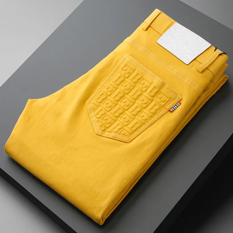 高级感艳色男字母洗水裤子柔软轻奢级夏季休闲时尚牛仔裤男士凸胶