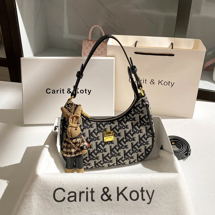 Carit Koty复古撞色刺绣月牙法棍包包女2025新款高级感帆布腋下包