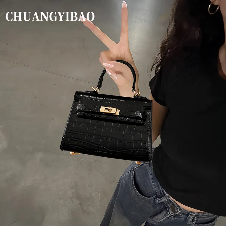 秋冬女包设计轻奢黑色手提凯莉包包女式2025新款超火高级感斜挎包