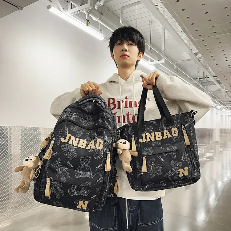 书包男生初中生高中大学生印花女生背包小学生2024新款旅行双肩包