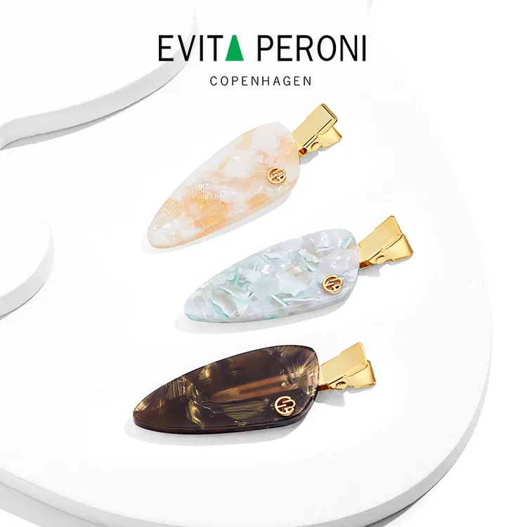 Evita Peroni/依慧达新款树叶边夹设计感简约DB