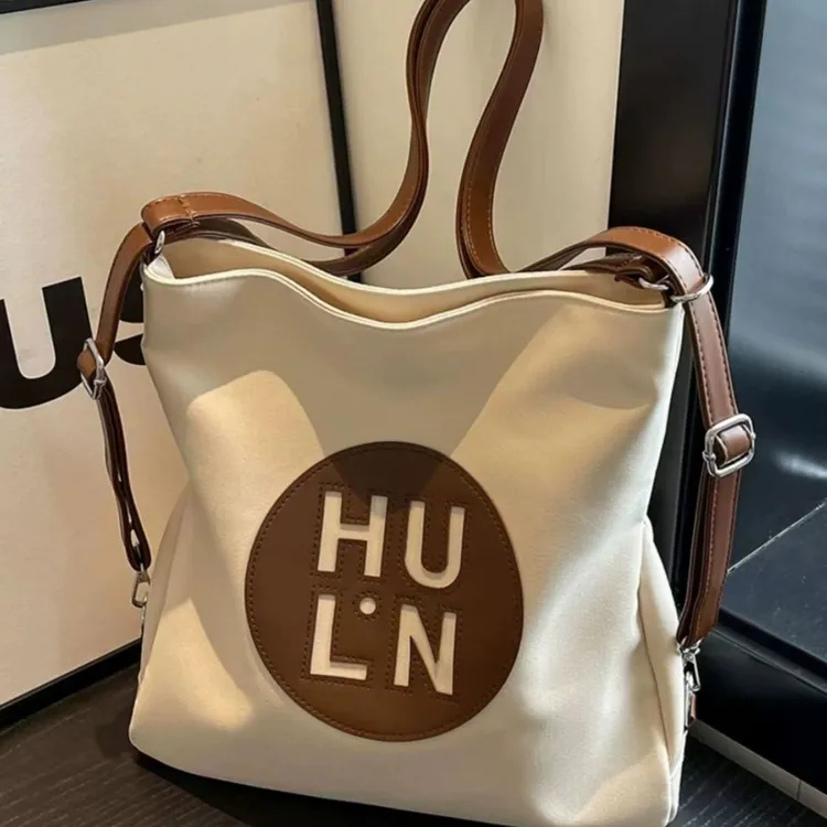 帆布包包女2025超火时尚大容量多用双肩包学生上课通勤单肩托特包