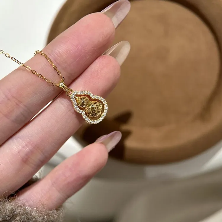 铜合金项链 旋转金色葫芦项链女款轻奢新中式锁骨链双面百搭配饰