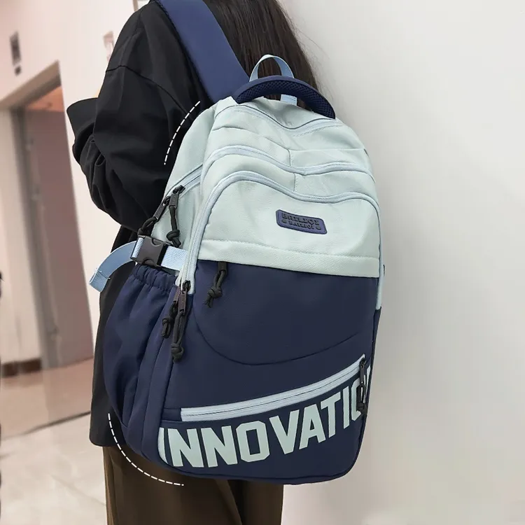 护脊减负双肩包男款高中学生书包男小学生初中女生大容量旅行背包