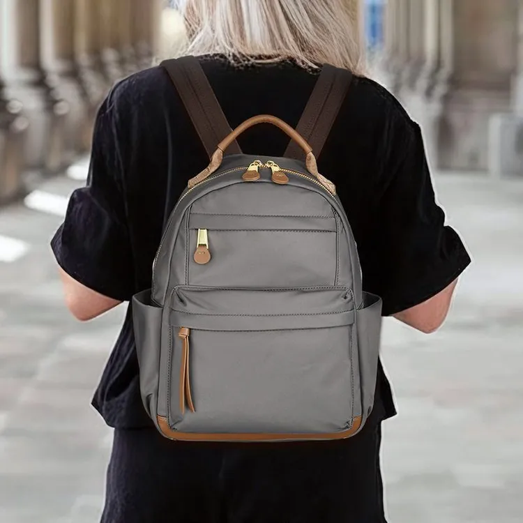 真皮双肩包女时尚旅游轻便女士旅行背包通勤电脑包高中学生书包