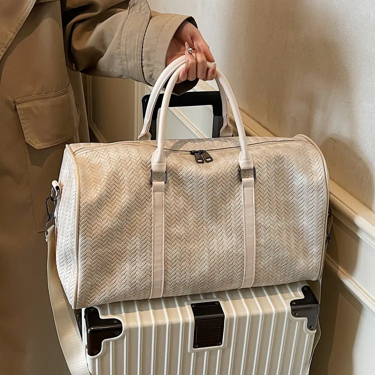 北尹嘉木男士旅行包大容量手提编织行李袋休闲健身短途出差登机包