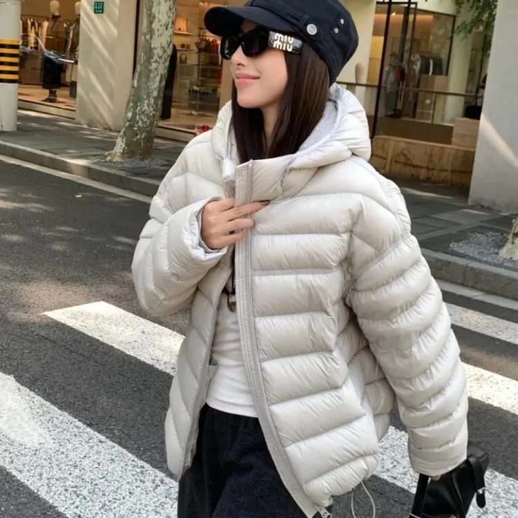 加厚连帽羽绒服女2025冬季新款短款龟背轻薄排骨蓬松90白鸭绒外套