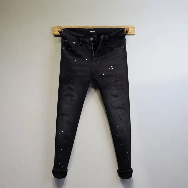 潮牌秋冬季新款黑色水洗破洞个性泼墨修身牛仔长裤男士痞帅小脚裤