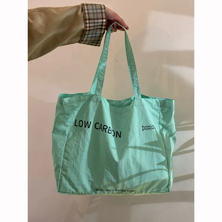 迪丽热巴同款松弛感单肩包2025新款大容量百搭慵懒风帆布托特包