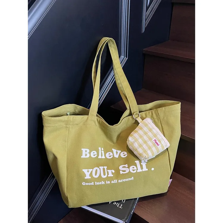 大容量松弛感帆布包女2025新款时尚休闲手提单肩包日常通勤托特包