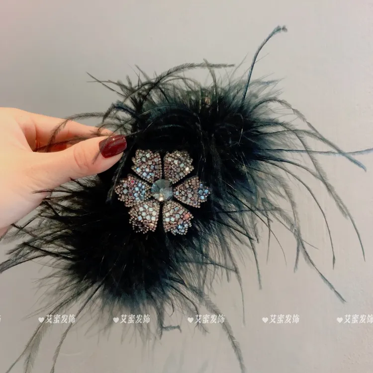 新品羽毛雪花氛围感精致抓夹后脑勺盘发夹时尚高级发饰