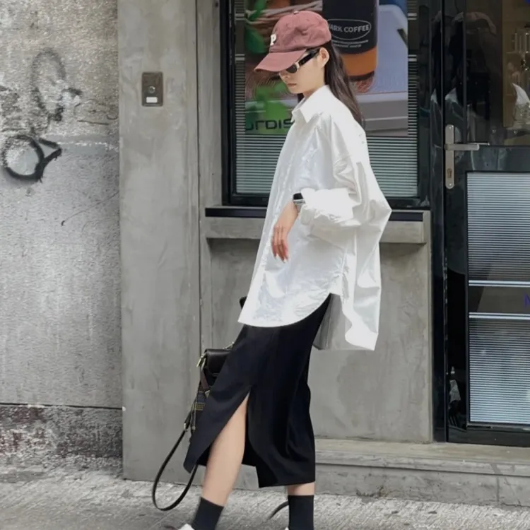 春季新款设计感白色衬衣+黑色半身裙2025休闲高级感爆款套装裙女