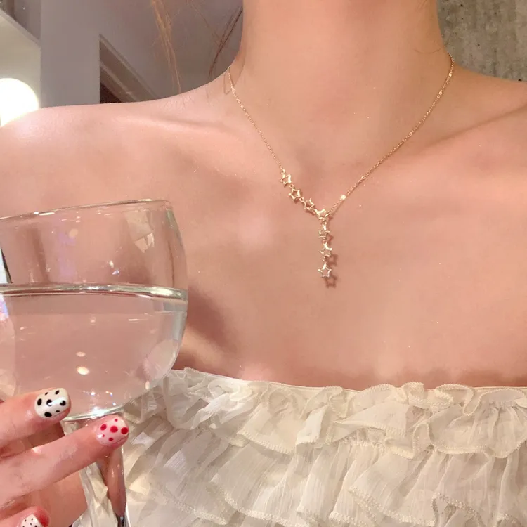 铜合金项链 秋冬韩系金色镂空五角星星流苏项链女轻奢颈链毛衣链
