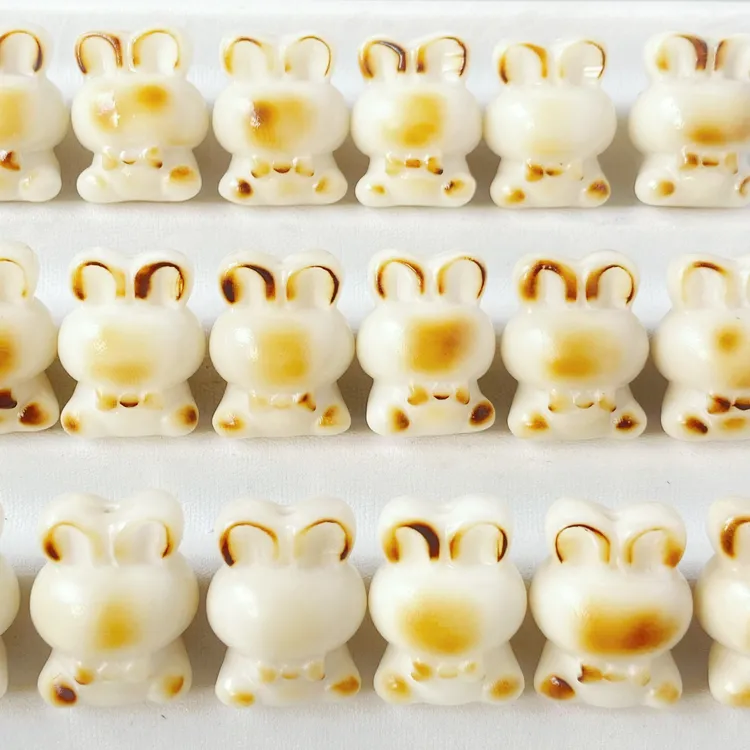 象牙果菩提雕刻单珠散珠子炭烧小兔子小熊松果墩子猫爪吊坠桶珠