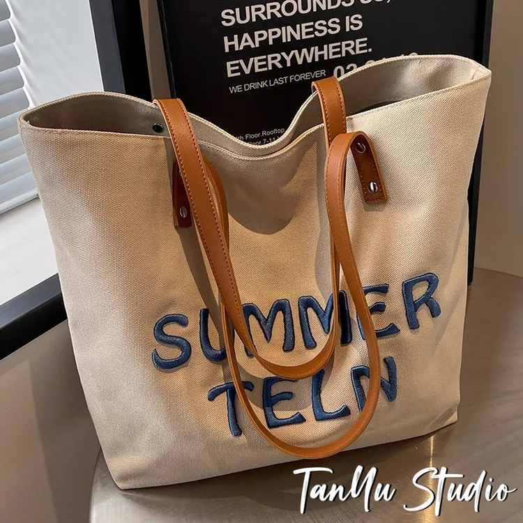 探屿文艺小众时尚托特包2025新款简约百搭大容量帆布包通勤单肩包