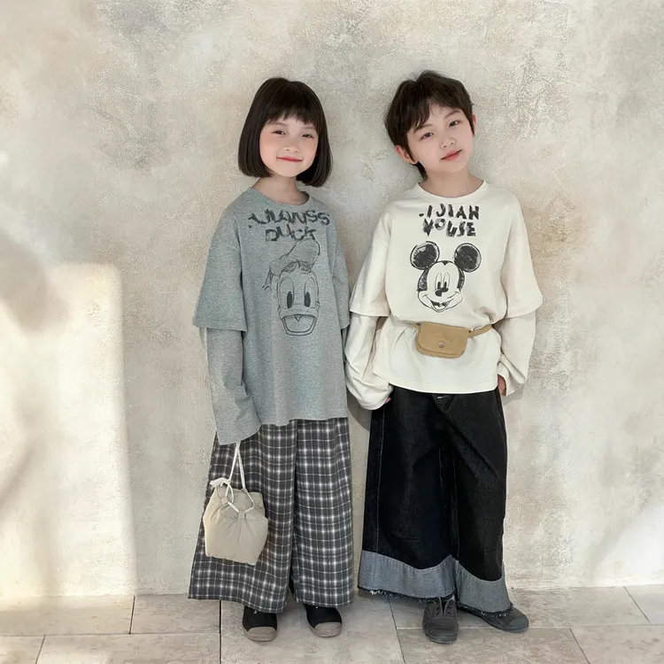 秋季新款韩版儿童假两件卡通印花T恤男女童宽松百搭衣服圆领长袖